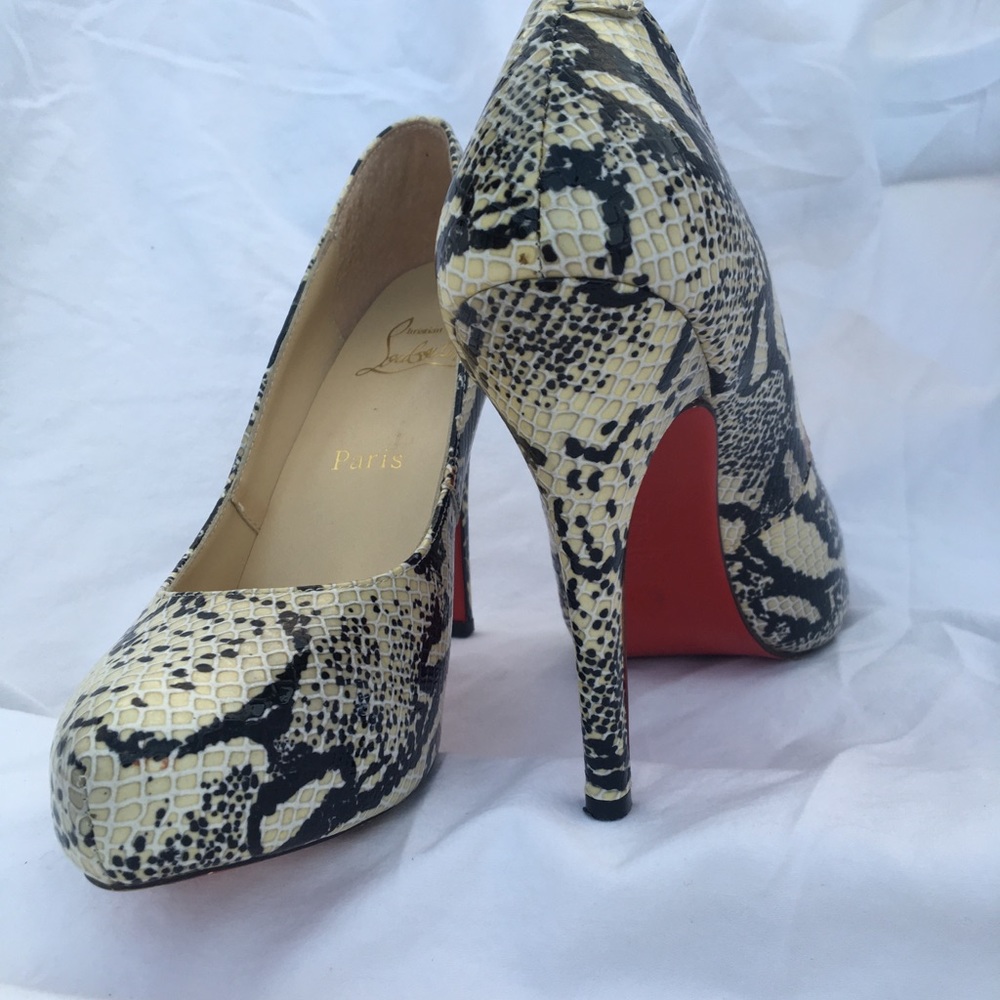 Snakeskin Christian Louboutin heels.